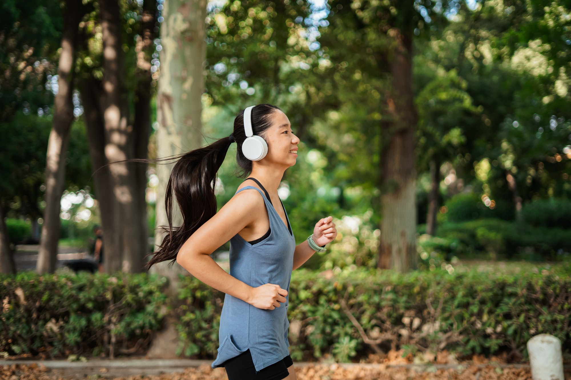 Fitness young woman jogging in the park